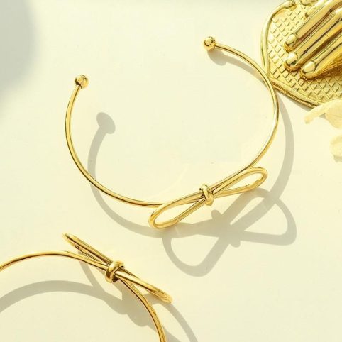 The On-Trend Gold Plated Bow Bangle Is Made From Stainless Steel - From Source Lifestyle